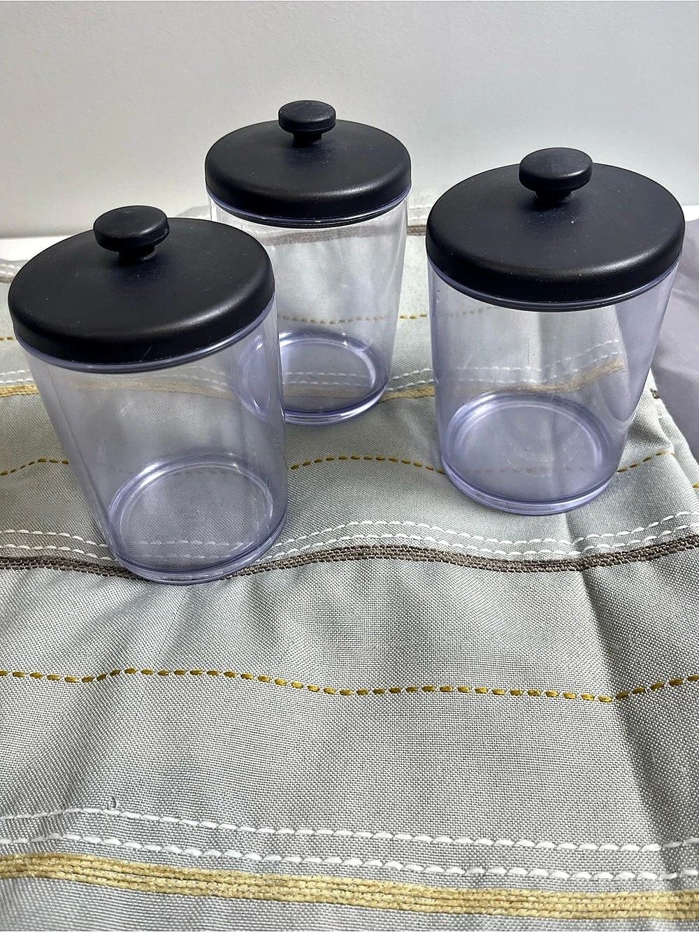 Gray Striped shower curtain, line, bathroom canisters and rings
